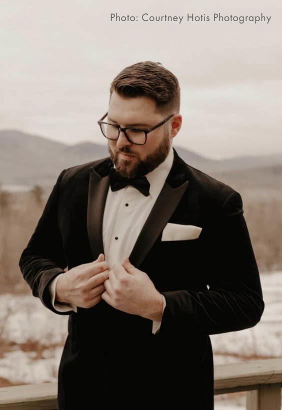 Photo of model wearing a Suit & Tux collection dress